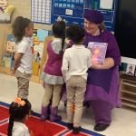 Teacher reading storybook to Students